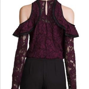 A maroon lace Alexis top